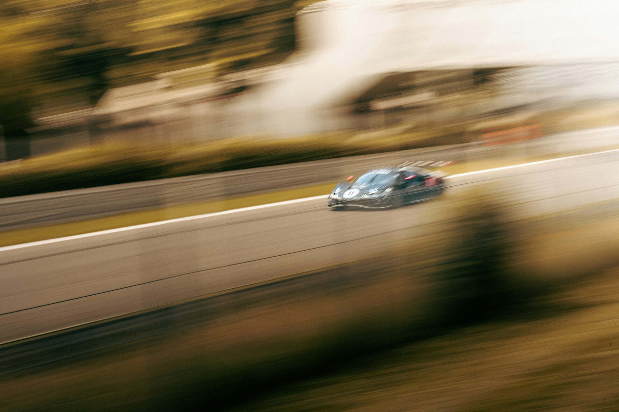 Racecar pan photo on race track